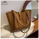 thumbnail image 4 of Bolso de madre de color puro 2024 nuevo bolso de mujer bolso de mano simple bolso de hombro de gran capacidad de moda de otoño e invierno, 4 of 5