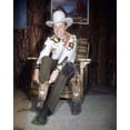 thumbnail image 1 of Roy Rogers 1940's at his home putting on cowboy boots 4x6 inch photo, 1 of 1