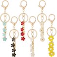 thumbnail image 1 of 6 llaveros de flores doradas, bonitos llaveros de margaritas y cerezas, 6 colores de esmalte, accesorios de metal divididos, llaveros a granel, 1 of 6