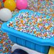 thumbnail image 5 of Perlas de relleno con peso de pellets de polietileno para juegos sensoriales, arena para niños, 5 paquetes, piedras de colores, ver detalles, juguetes de plástico para niños, 5 of 6