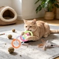 thumbnail image 4 of Soft Mesh Tube Donut Cat Toy with Bells, Interactive Teething Chew Ring for Indoor Cats, Crinkle Voice Kicking Toy for Tooth Th, Multicolor, by IHXORA, 4 of 6
