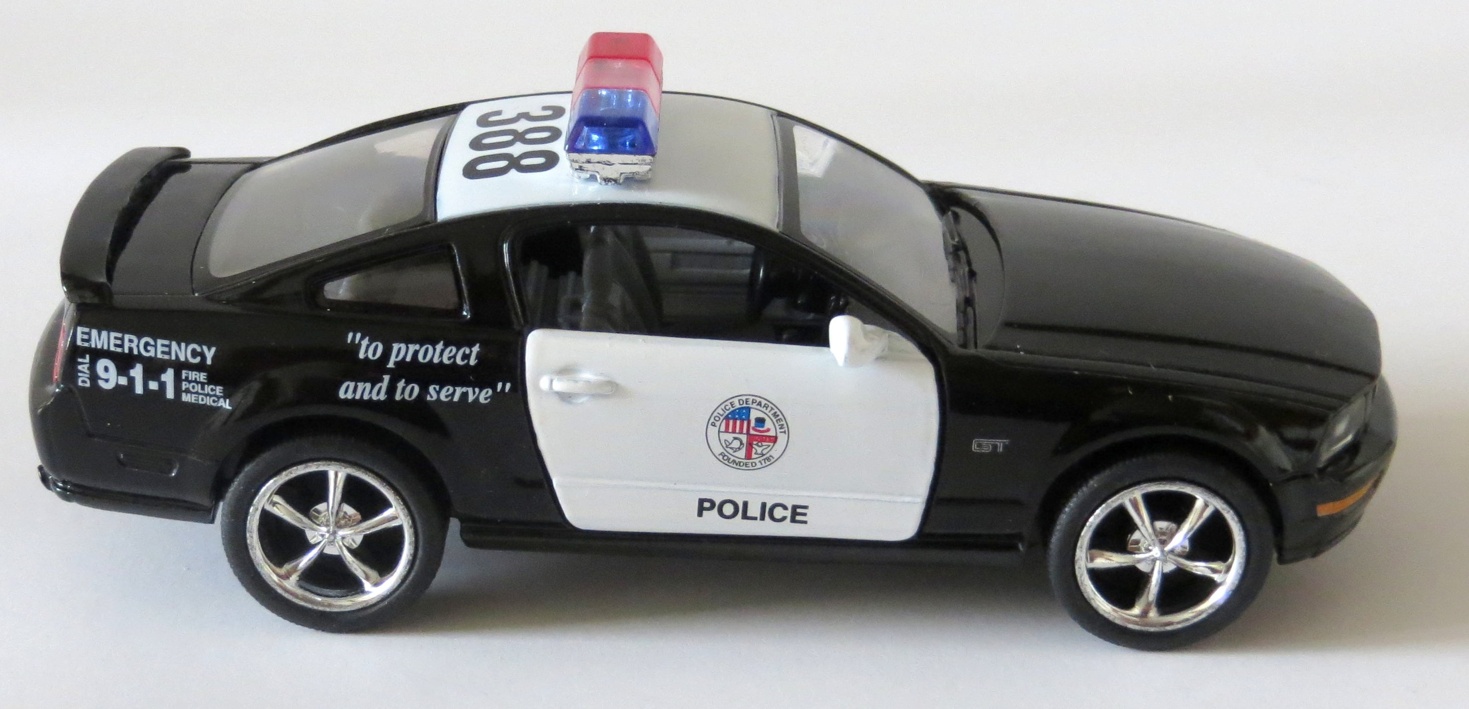 Black and White Ford Mustang GT Police Car with Pullback Action