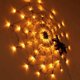thumbnail image 1 of Luz LED de telaraña negra de Halloween con 70 luces de red LED naranjas impermeables y 1 araña negra para el hogar, jardín, interior y exterior, tema aterrador de Halloween, 1 of 5