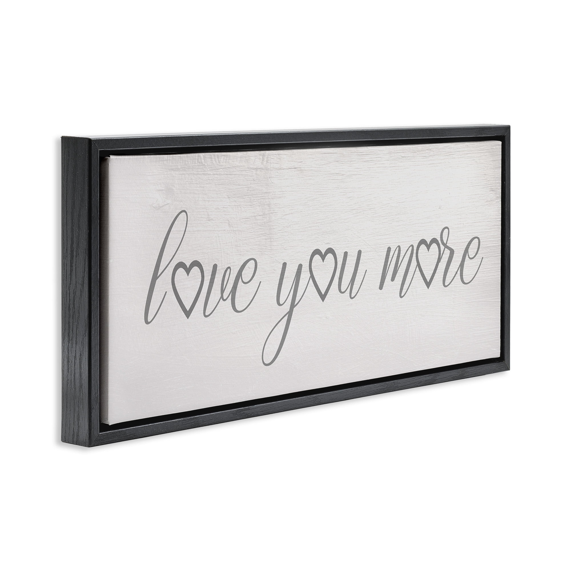 Stupell Industries Love You More Heart Icon Typography Painting Black Floater Framed Canvas Art Print Wall Art, 25 x 11