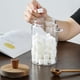 thumbnail image 5 of ANSQU Juego de 2 Frascos de Vidrio para Almacenamiento de Alimentos con Tapas de Madera 1L, 5 of 8