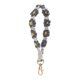 thumbnail image 1 of Llavero bohemio de flores tejidas a mano con colores contrastantes, pulsera y colgante para telfono., 1 of 7
