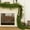 A, variant on Darzheoy 9FT Christmas Garlands Norfolk Pine Garland Faux Greenery Pine Garland for Table Mantle Wall Holiday Indoor Outdoor Christmas Decorations