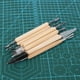 thumbnail image 4 of 11 Uds herramienta para esculpir arcilla mango de madera de acero inoxidable suministros tallados para modelado11 Uds herramienta para esculpir arcilla, 4 of 5