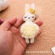 thumbnail image 4 of 10-15cm Juguetes de peluche suaves Lindo llavero de peluche de animal Colgante Vestido Conejo Bolso Adornos de coche Regalos de cumpleaños y Navidad, 4 of 5