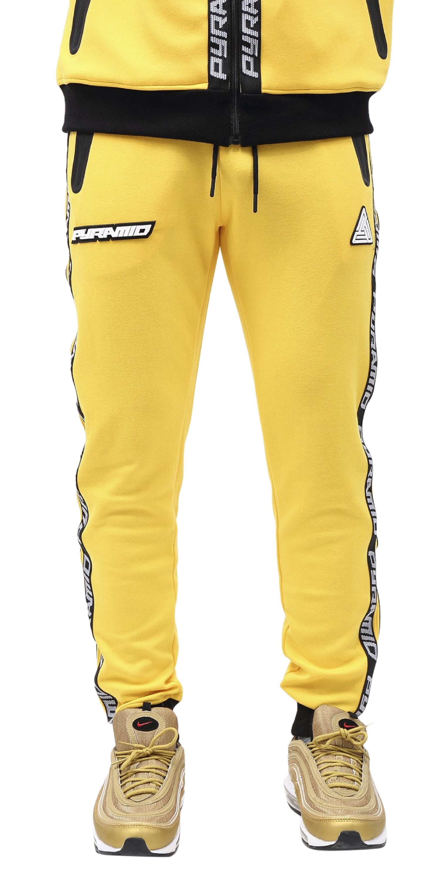 yellow joggers with black stripe