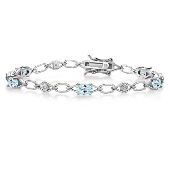 Gem Stone King 925 Sterling Silver Sky Blue Topaz and Round White Lab Grown Diamond Tennis Bracelet for Women (3.04 Cttw, Gemstone Birthstone, Oval 6X4MM, 7.25 inches)