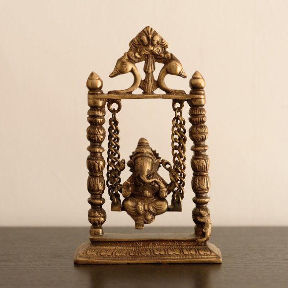 Brown & Golden Brass Lord Ganesha On Peacock Swing (Jhoola)