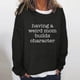thumbnail image 1 of Puntoco mujeres de gran tamaño texto divertido letra impresa cuello redondo manga larga suelta solo sudadera tops pulóver blusa Puntoco Puntoco-2430, 1 of 3