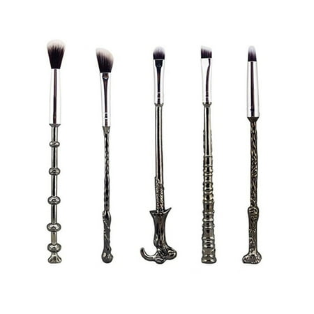 five makeup brushes that look like wizard wands from Harry Potter.