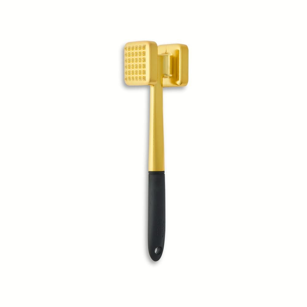 Attendrisseur de viande au thym et à la table en finition or poli Attendrisseur