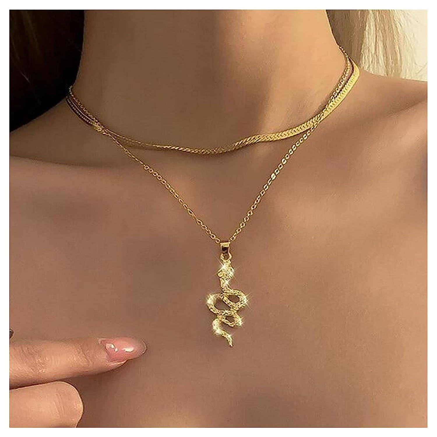 Gold serpent necklace best sale