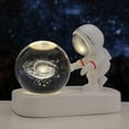 thumbnail image 2 of Bola de cristal tallada con luz de noche con forma de astronauta y base luminosa para estudiantes y amigos, 2 of 6