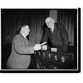 thumbnail image 2 of Historic Framed Print, Texas Representative talk on his pension bill. Washington, D.C., Feb. 3. Representative Wright Patman, Texas, shown here with Robert L. Doughton, Chairman of, 17-7/8" x 21-7/8", 2 of 9