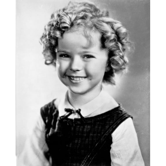 Shirley Temple wearing a White Blouse with a Black Gymslip Photo Print (24 x 30)