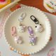 thumbnail image 2 of Sanrio personaje de animación de dibujos animados Melody Pochacco llavero lindo colgante Kawaii Kuromi Cinnamoroll lindos accesorios regalo de vacacio, 2 of 5