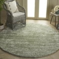 thumbnail image 2 of SAFAVIEH Tahoe Trudi Distressed Shag Area Rug, Sage/Ivory, 6'7" x 6'7" Round, 2 of 8