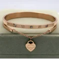 thumbnail image 3 of Pulsera Ryscom con cristal de zirconia y dije de corazon oro rosado casual, 3 of 5