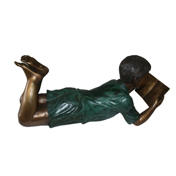boy laying reading book bronze Statue -  Size: 24"L x 10"W x 11"H.
