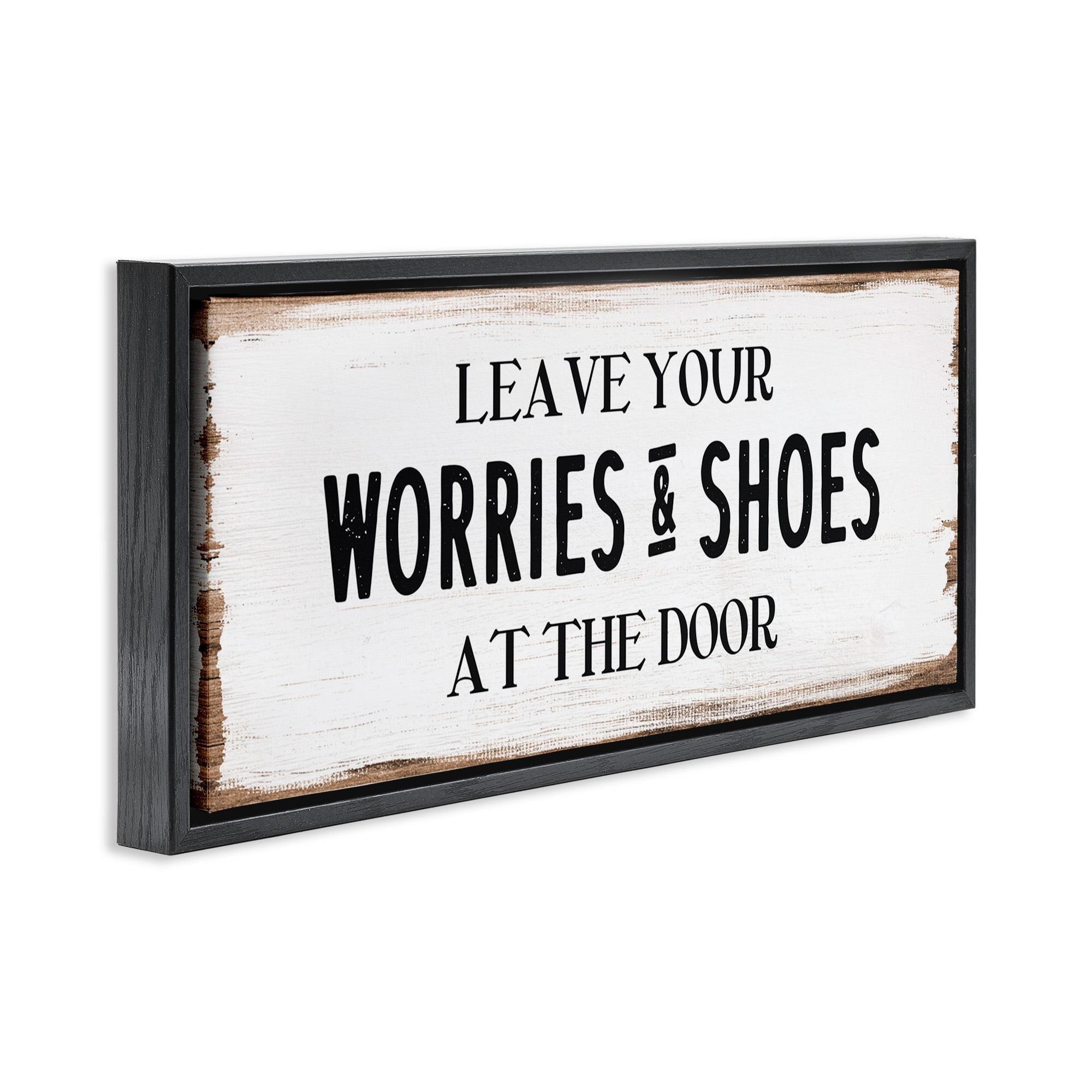 Stupell Industries Worries & Shoes At Door Phrase Typography Painting Black Floater Framed Canvas Art Print Wall Art, 25 x 11