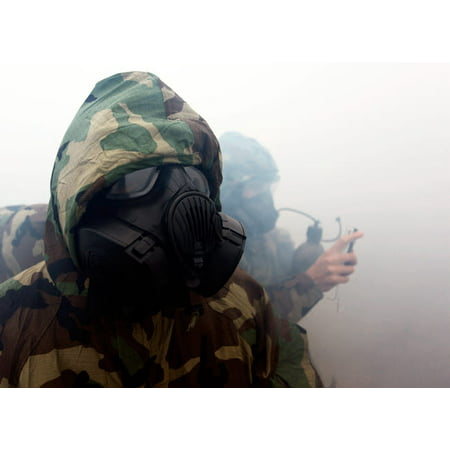 A Marine wearing a gas mask during during chemical warfare training Poster Print by Stocktrek