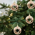 thumbnail image 1 of xihome Paquete de 4 adornos navideños de plstico en forma de estrella para colgar en la punta del rbol, con diseño de rosquilla, caramelo y bagel., 1 of 5