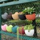 thumbnail image 5 of Billuyoard Maceta montada en la pared Cesta colgante Maceta Cubo Jarrón de jardín Interior Exquisito Al aire libre Plástico para adornos Almacenamiento y organización del hogar Rojo ladrillo/S Billuyoard HA083746-06, 5 of 6
