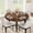 Brown, variant on Eastvita 47-inch round industrial dining table for 4. Boasts a sturdy metal frame/a rustic wood finish. Perfect for dining rooms/kitchens//living rooms.
