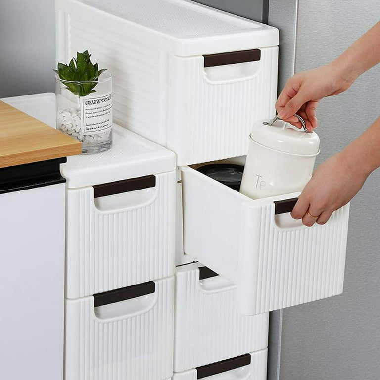 Bathroom closet organization with plastic drawer bins, tiered