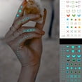 thumbnail image 4 of Blue Luminous Tattoo Sticker , Constellation Deer Feather Butterfly Snake Pattern, Waterproof Temporary Tattoo Finger Wrist Body Art For Women And Kids, 4 of 5