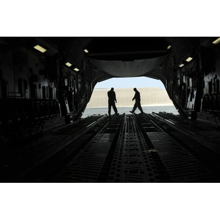 January 20 2010 - C-17A Globemaster III loadmasters go through prefight checks on the ramp prior to loading cargo for an airlift mission at a forward operating base in Southwest Asia Poster (Best Way To Travel Through Southeast Asia)