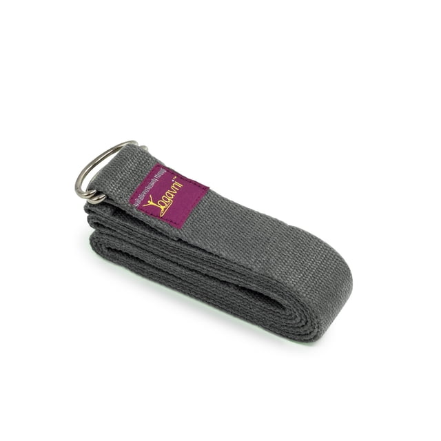 Yoga Strap - D - Ring Buckle 8ft - Yogavni (Grey). A durable grey yoga strap made of cotton fabric with a metal D-ring buckle. The strap measures 8 feet (2.5m) in length and 1.5 inches (4cm) in width, designed for securely wrapping around rolled yoga mats, blankets, or towels. The Yogavni logo is visible on a purple tag near the buckle. Ideal for carrying mats up to 14mm thick. Lightweight at 12oz (350g) and machine washable.