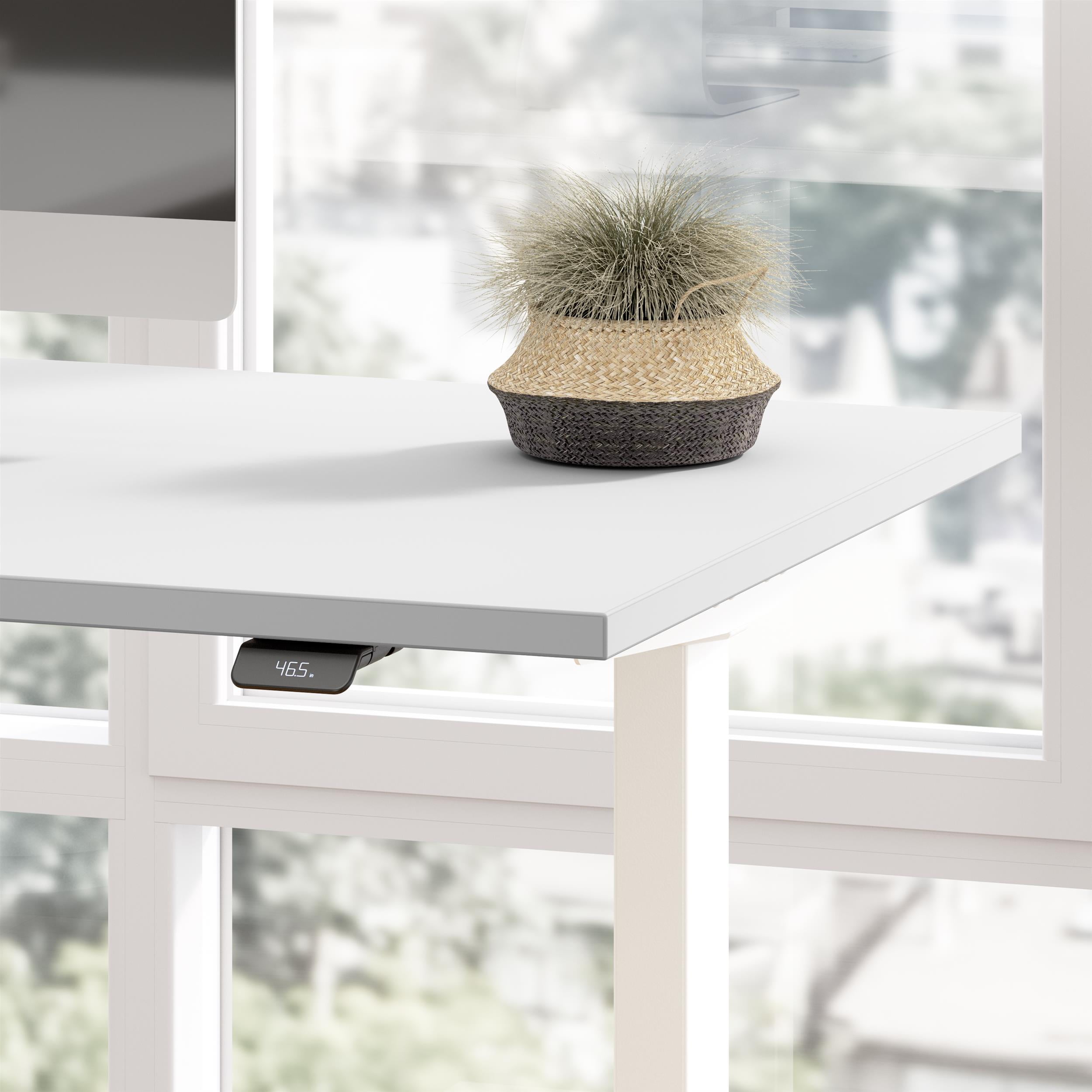 Move 40 Series 72W Adjustable Standing Desk in White - Engineered Wood