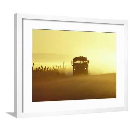 Rural School Bus Driving Along Dusty Country Road, Oregon, USA Framed Print Wall Art By William