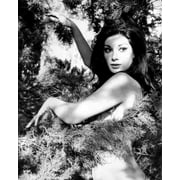Edwige Fenech poses no clothes on covering herself with tree branch Poster 16x20