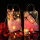thumbnail image 2 of Bolsas de regalo Saintrygo de PVC transparente con asas de 23 x 17 x 7 cm (25 unidades), 2 of 6