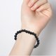 thumbnail image 2 of Pulsera multicapa de cuero trenzado con cuentas de madera negra, 2 of 3