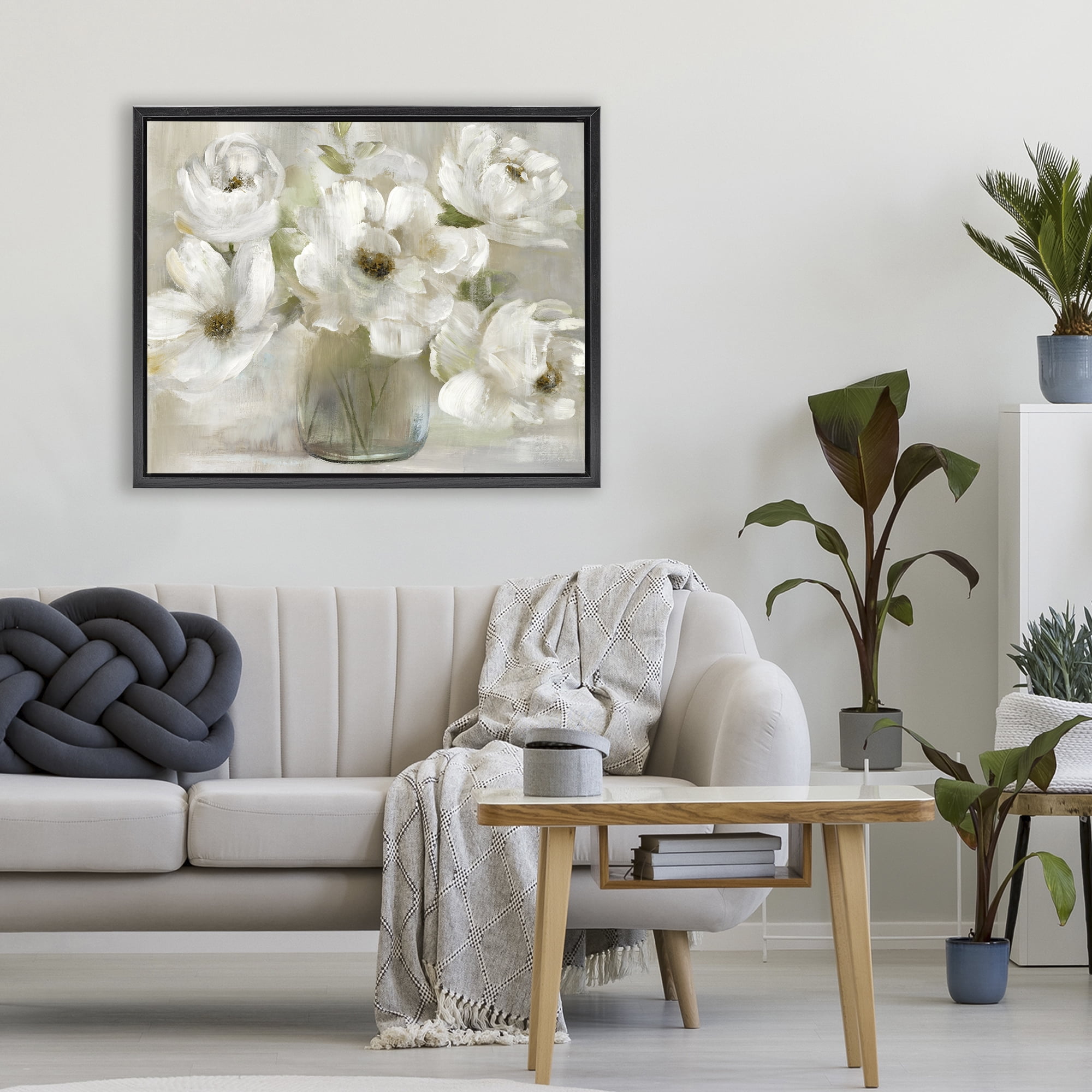 Stupell Industries Gentle White Petals in Vase Black Framed Floater Canvas Wall Art, design by Nan