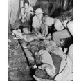 thumbnail image 2 of A Wounded American Soldier Gets A Blood Transfusion In New Guinea Jungle. The U.S. Army Was Fighting Against The, 2 of 2