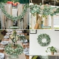 thumbnail image 5 of Scidweet Christmas Greenery Garlands, 6.56 ft Artificial Greenery Eucalyptus leaf Garland with White Buds for Home Wedding Party Table  Mantle Holiday Christmas Decorations, 5 of 7