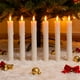 thumbnail image 5 of Velas de cera de 7,5 pulgadas, sin llama, a pilas, con temporizador y regulador de intensidad, 6 portavelas blancos para ceremonias, fiestas, Navidad y Halloween., 5 of 5