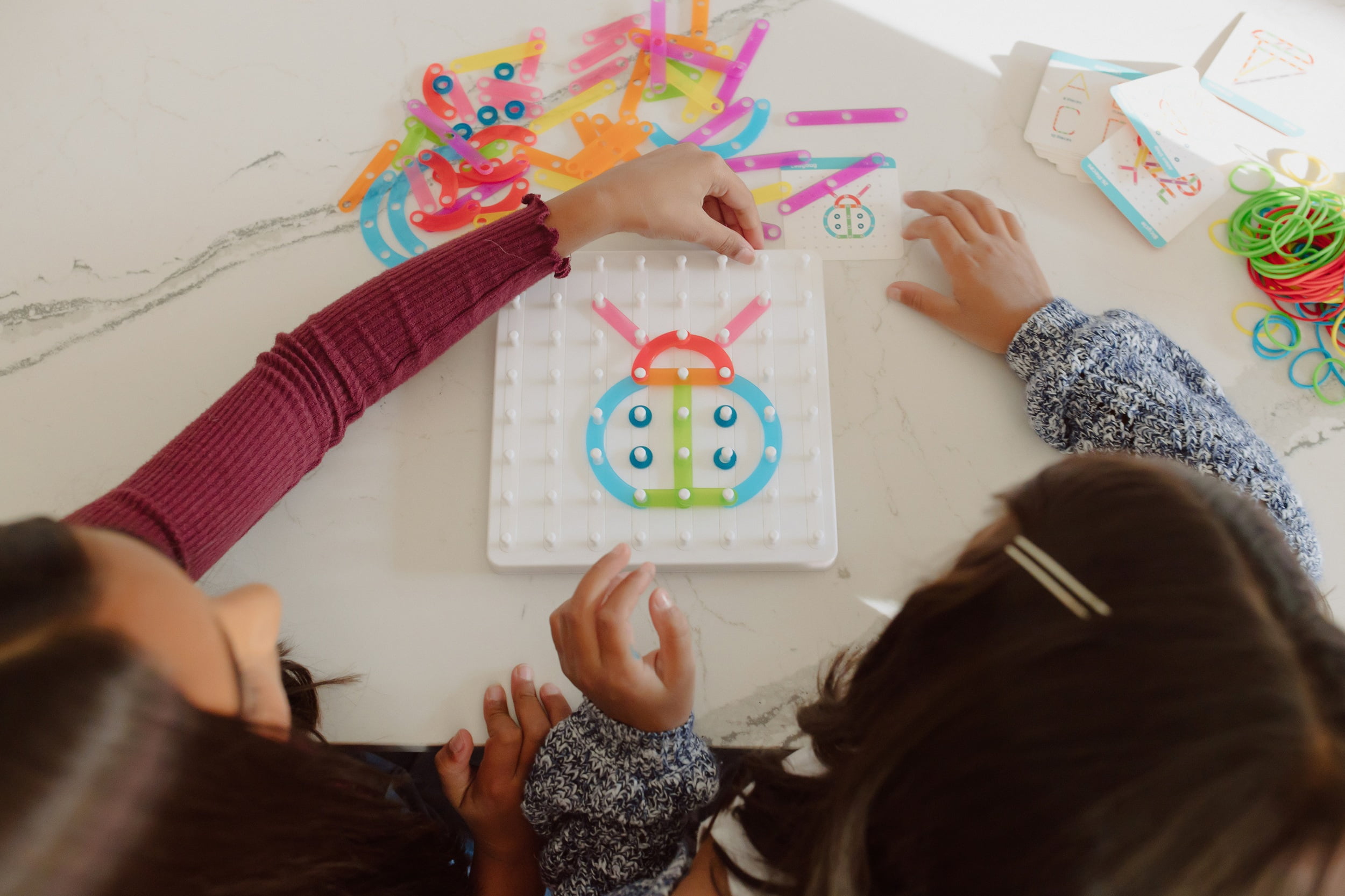 Chuckle & Roar Pegboard Creations Includes 50 Design Challenges for Children Ages 5 and Older