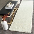 thumbnail image 3 of SAFAVIEH Laguna Neven Plush Solid Shag Area Rug, Ivory, 5'3" x 7'6", 3 of 5