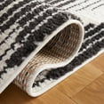 thumbnail image 5 of SAFAVIEH Moroccan Tassel Janetta Wavy Striped Area Rug, Ivory/Black, 8'8" x 12', 5 of 8