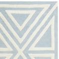 thumbnail image 5 of SAFAVIEH Kids Triangle Shapes Wool Area Rug, Blue/Ivory, 5' x 7', 5 of 6