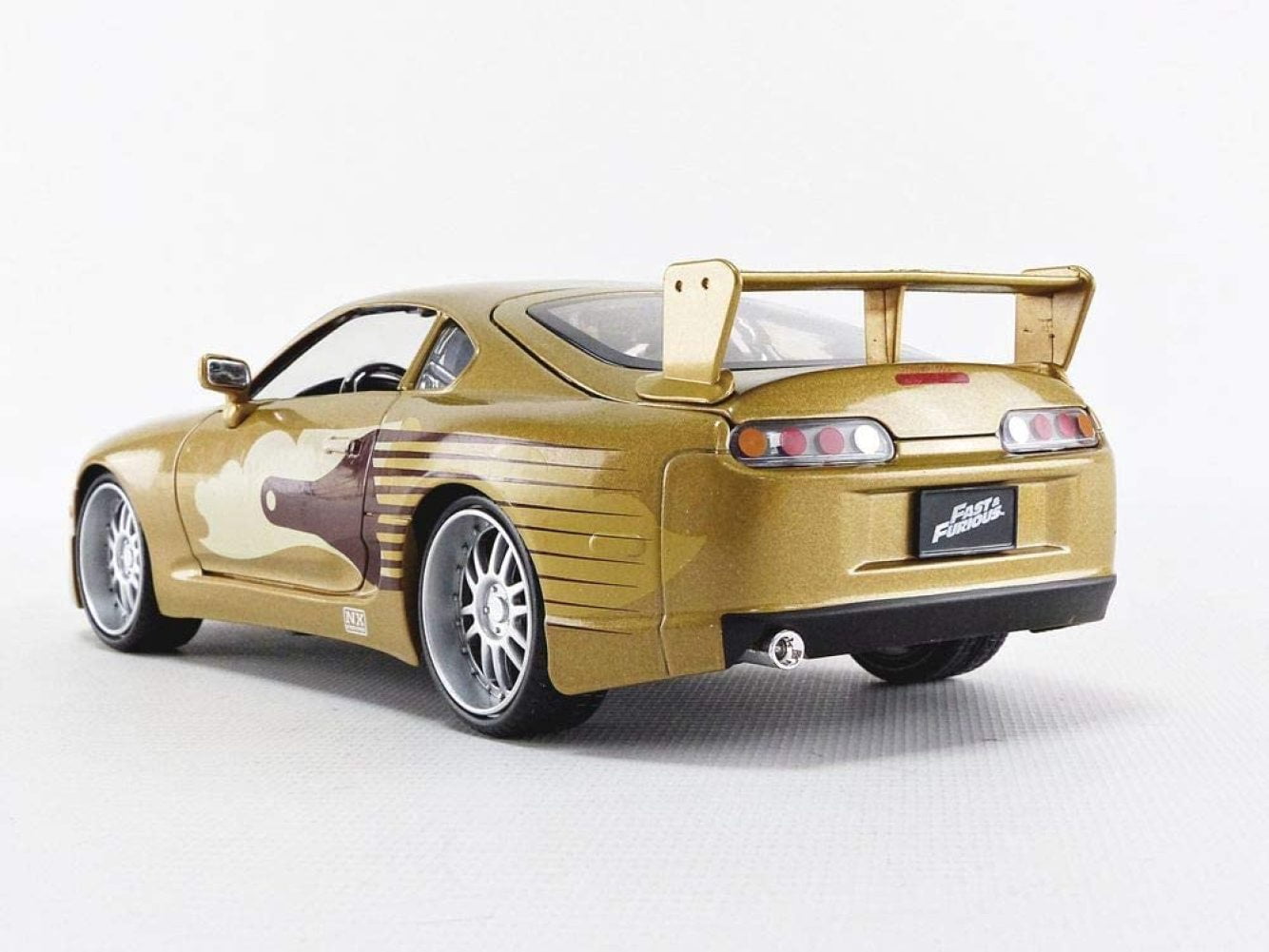 Jada Fast 2 Furious Slap Jack's Toyota Supra Die-Cast Collectible Toy Vehicle Car - Gold with Decals - 1: 24 Scale - Copper